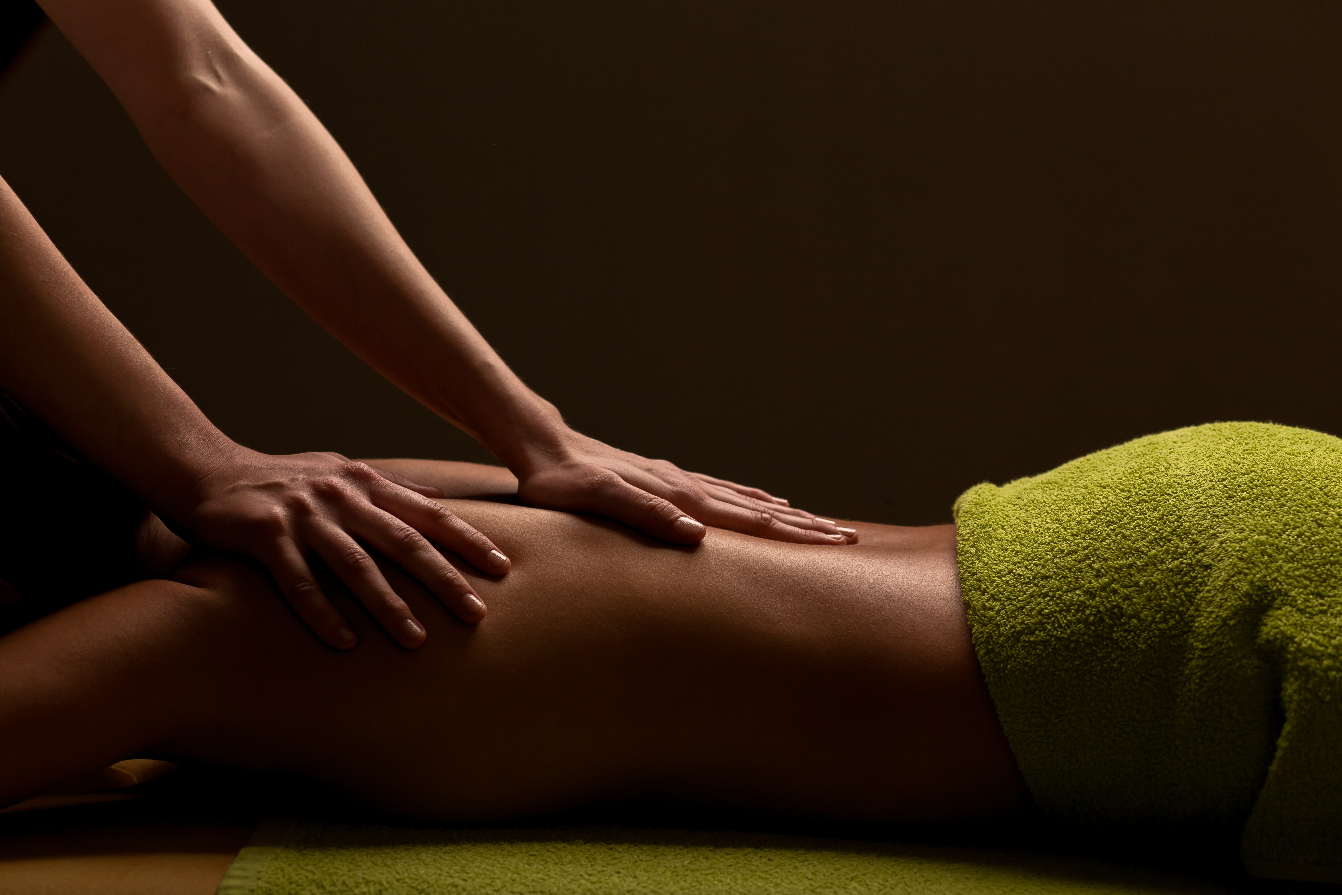 A massage treatment in a calm spa setting
